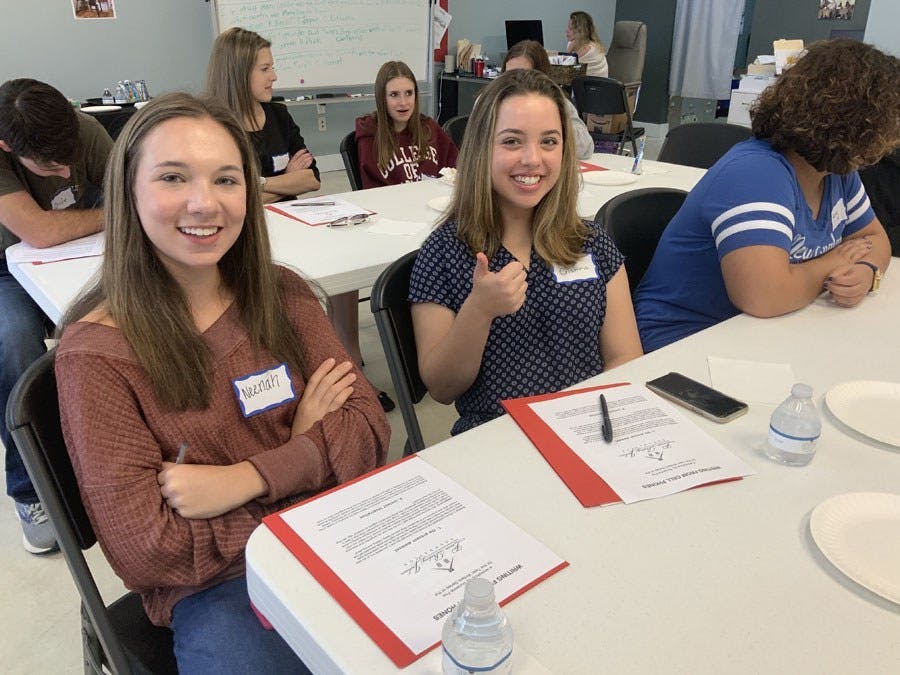 Teens at a Laura Riding Jackson workshop, one teen giving a thumbs up
